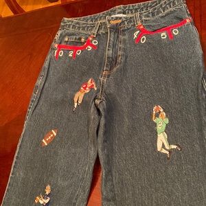 Belle point size 6 jeans , never worn .embroidery all over w,football designs !!
